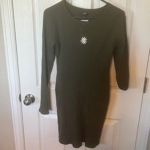 Green form fitting dress